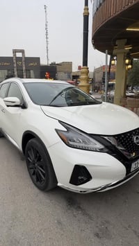 نيسان مورانو SL فول عدا الفتحة  موديل 23 رقم بغداد باسمي  ماشية 45 الف...