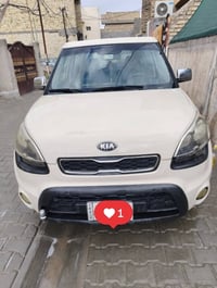 كيا صول 2013 وراد امريكي رقم بغداد مشروع وطني بسمي السياره ضررها بسيط ...