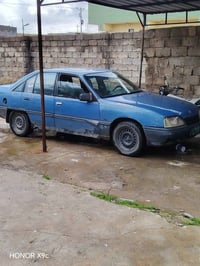 اوبل اومكيا حجم 20 موديل 89 كابون موجود محرك كير شرط لا صرف ولا نفخ 07...