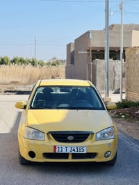 سبكترا 2006رقم بغداد انكليزي كير ومحرك وحداديه كفاله تخم تاير جديد مال...