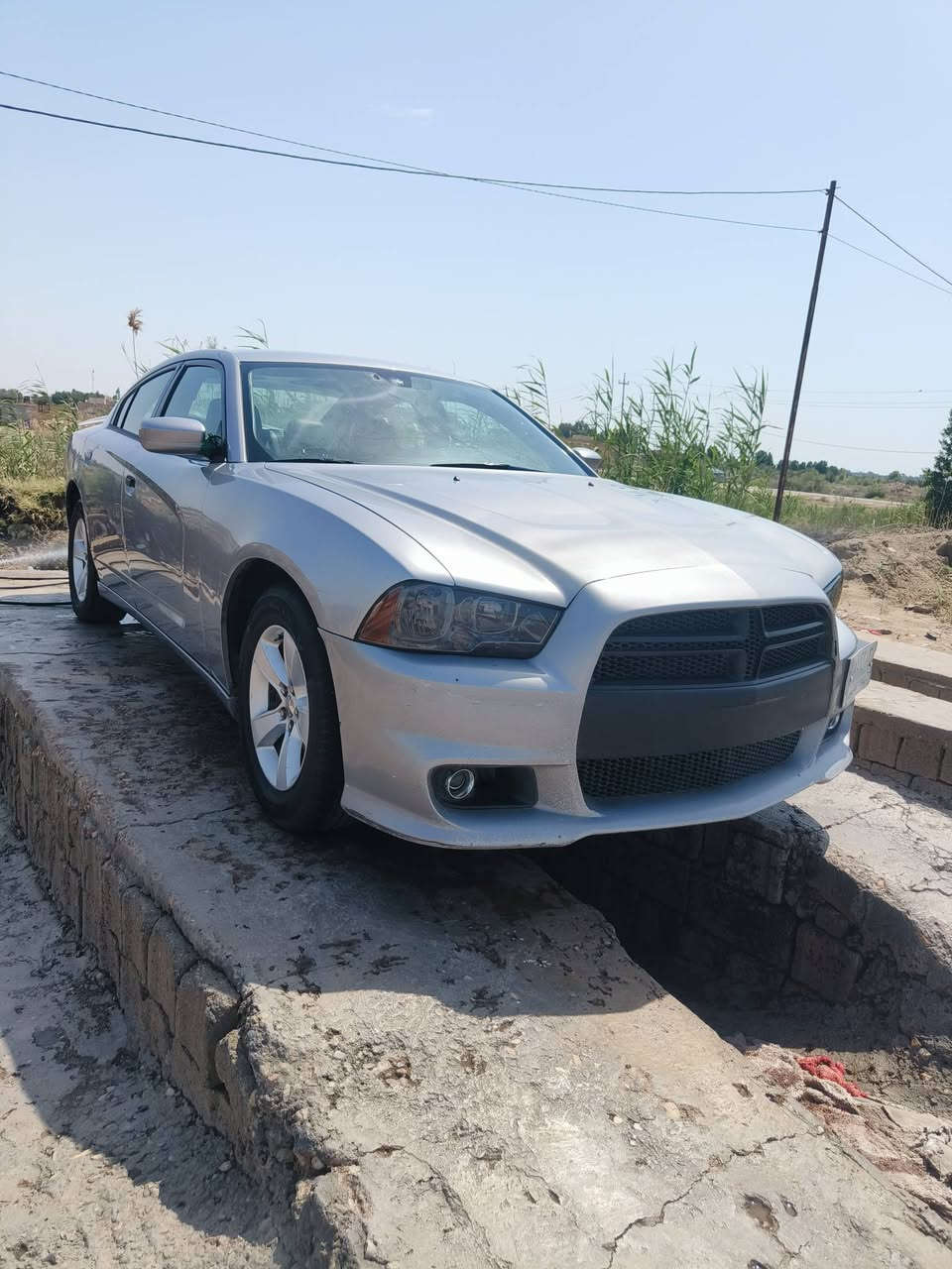 شارجر موديل 2014 سياره جاهزه كير محرك حداديه الخلفيه فوك الموديل وره  كير جديد صار سبوع من شاده طياره كشن كهربائي شاشه كبيره شفتات  سياره جاهزه تايرات جديده  سعره 140 $ الي حاب يتواصل واتساب ***********
