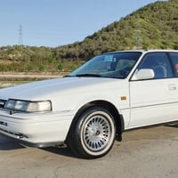 مازدا ١٩٩٠ • رقم سليمانية ٢٠٢٧ • أبيض