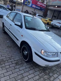 سمند موديل 2010 السياره ابيض خصوصي هزه ورقم جديده  بسمنا  السياره مرتب...