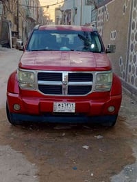 دوج نترو 2009مكفوله من  الضربه والصبغ سياره جديده دواخله حلوه  بس جراد...