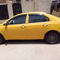 سياره ليفان موديل 11 مصفره هيئه 07800037934