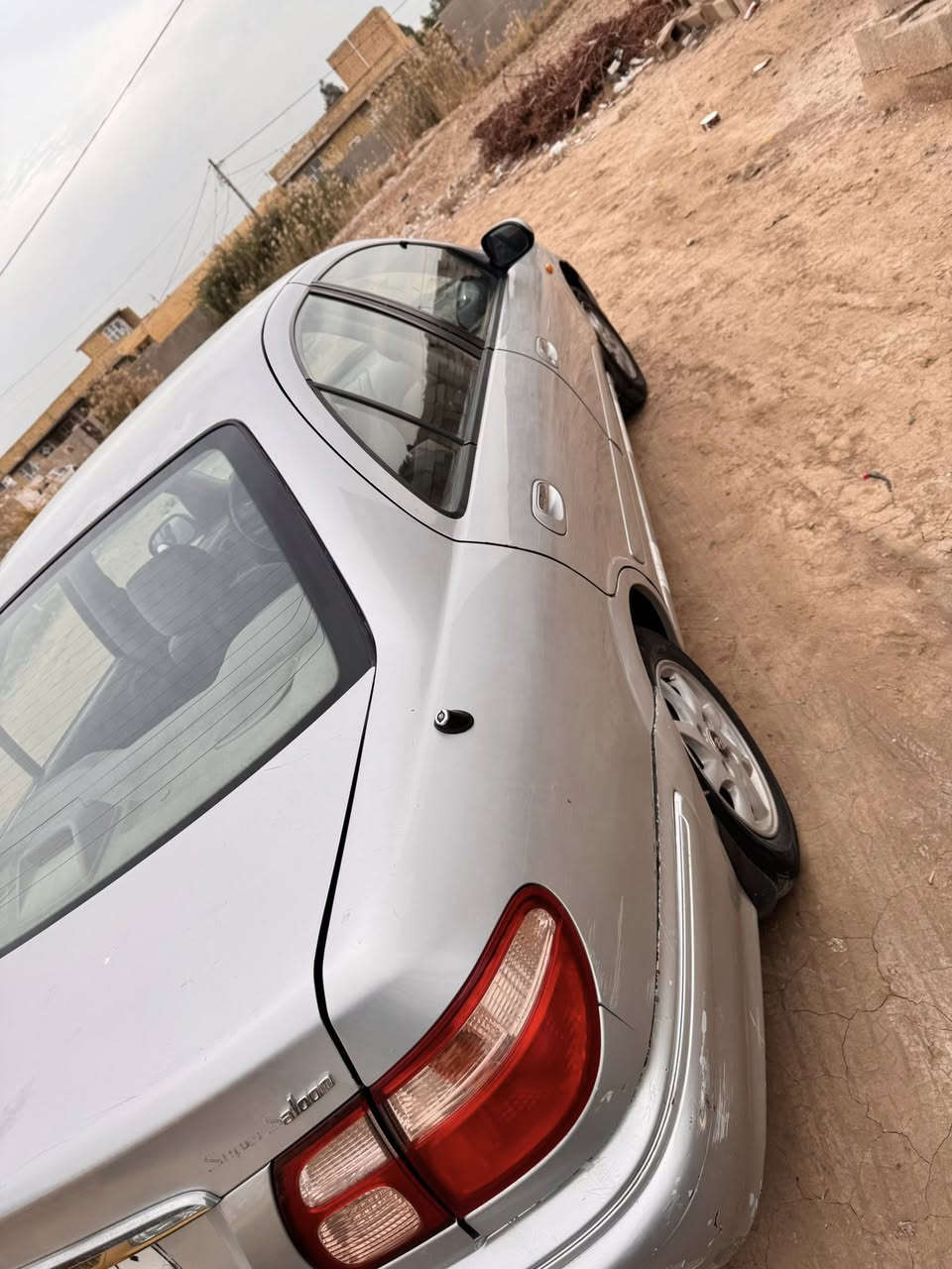 نيسان سني موديل 2000  محورة بيه قطعتين صبغ  مكاني كوت ***********
