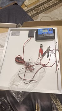 لوح طاقة شمسية • يشحن باتري • باتري سيارة