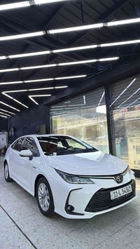 كورلا 2024 داخل قرميدي  ماشية 24000 بيها طخه بسيطة بلدعاميه  رقم 07718...