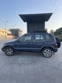 كيا سبورتج موديل 2001 رقم بغداد باسمي محرك 2000 مسكر ابلادي والكير ابل...