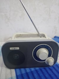 راديو FM • بطارية • كاميرتين