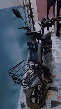 دراجه شحن 14 جديده مكفوله من كلشي 6 سويج وياها وجهاز انذار جديده استعم...
