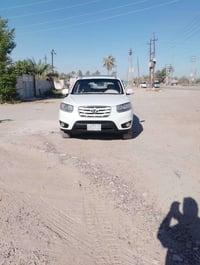 هيونداي سنتا في 2010 خليجي V6 بدون حادث رقم بغداد  120km جرص ٦ سلندر ٣...