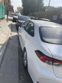 كورلا 2025 هايبرد ماشيه 6000 زيرو مكفوله رقم بغداد بأسمي للبيع او مراو...