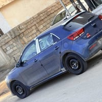 / كيا ريو مديل 23 مواصفات : تحكمات ستيرن + كروز سرعه وسبورت هيترات كشن...