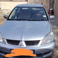 لانسر ٢٠١٠ رقم ديالى محرك ١٦٠٠  السعر ٧٥ للاستفسار الاتصال على الرقم 0...