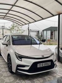 كورلا هايبرد 2024 نسخة البلاك رقم بغداد فول مواصفات كشن جلد كهرباء علا...