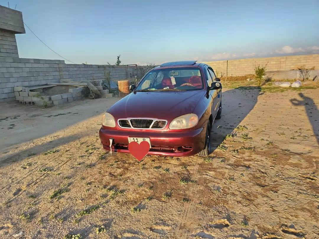 دايو لانوس للبيع
السعر ٣٨$ وبيها مجال 
موديل 1998 رقم بغداد انكليزي  شرط التحويل 
كير محرك صدر تخم تاير جديد كهربائيات كلها شغاله
مصبوغه حزام للجماليه  المكان صلاح الدين مكيشيفه  
الاتصال على الرقم ***********
