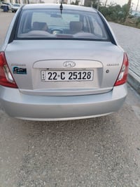 اكسنت 2009 خليجي محرك 1600 رقم وهزه جديده محرك وتبريد وحداديه جدد شاشه...