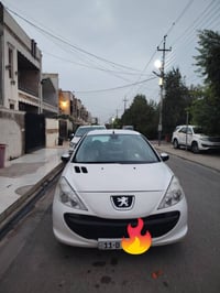 بيجو 206+ موديل 2012 ضرر قطعه ع بارد  كير عادي رقم بغداد جديد سنوية جد...