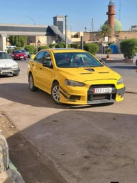 لانسر قرش GT  السعر 65 وبيه مجال فول موصفات فتحه وبصمه شفتات سرعه تحكم...
