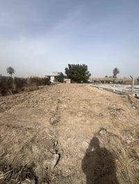 قطعة ارض مع بيت زراعي سند 25 المساحة الكلية 2000متر حي الزهراء للاستفس...