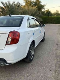 أوبتره موديل 2012 البيع.  السعر82 وبيه مجال بسيط  07812040903—-0750092...