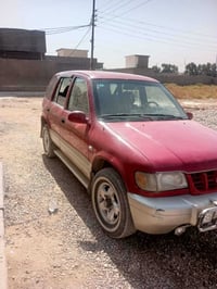 للبيع كيا سبورتج 2001   مكينه 2000كير عادي سنويه 2030بسمي. 07904430424