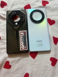 هونر x9a نضيف فقط بي فطر خفيف بالدائره هاي السودة مو مأثر ع الكاميرا و...