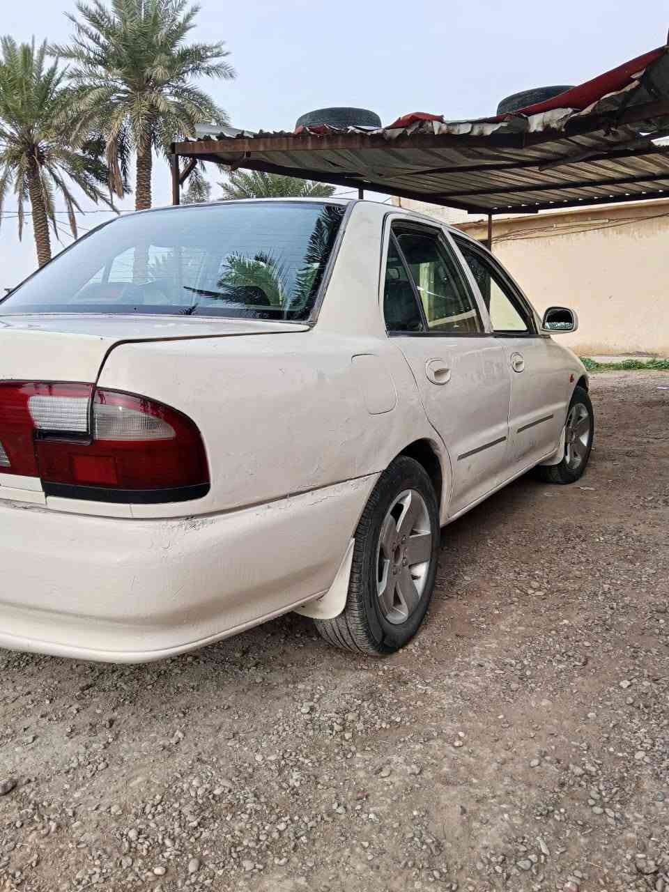 بروتون 2002 رقم انكليزي محرك كايم بس تمشي مابي شي تبريد ثلج تخم تاير للبيع او مراوس  عنوان بغداد محموديه ***********//‏‪***********‬‏
