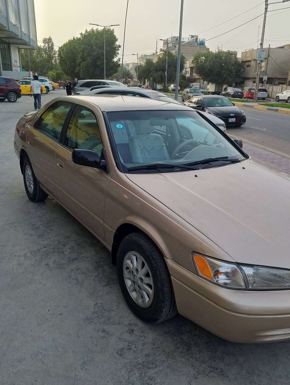 السلام عليكم موديل 97 كامري وارد امريكي سياره جديده وخير من الله رقم بغداد مكان السياره البياع السعر 85 رقم ***********
