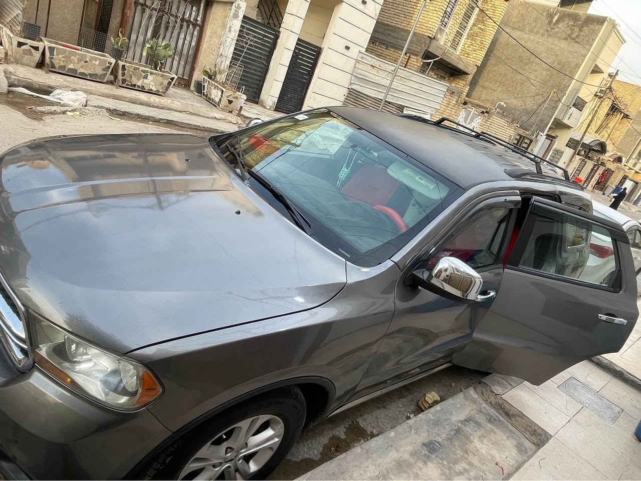 دوج دورنكو ٢٠١٢ رصاصي 
بسمي رقم بغداد انكليزي هزه جديده 
محرك كفاله ٦ سلندر 
كير كفاله 
مصبوغه حزام 
حادث امريكا صبغ عام 
ادامه كامله مابيه نقص اي شي 
تايرات جدد 
باتري جديد 
شواصي مكفوله 
لغود تكم كفاله 
سياره تحكم ستيرن ٤ جهات 
زينون لايتات 
كاميرا خلفيه وحساسات شاشه ايباد كار بلي 
٧ راكب ٣ قطع تبريد داخل احمر 
تجاوي كهرباء بصمه باب وتشغيل جنطه كهرباء ريمونت تشغيل عن بعد كشنات كهرباء 
مكان بغداد حي الجهاد 
*********** 
السعر ١٣٧ بغداد, العراق
