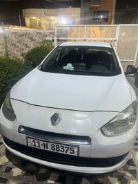 رينو فلاونس 2012 بيهه فقط باب خلفي وجاملغ باقي السياره كفاله  رقم بغدا...
