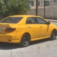 كورولا ٢٠١٣ • محرك ١٫٨ • رقم بغداد
