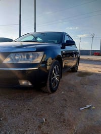 سوناتا  وارد أمريكي  موديل 2009 محرك 2000  رقم واسط الماني باسمي تبريد...