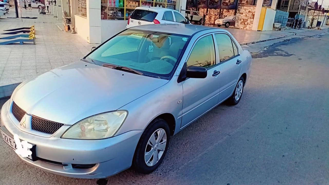 لانسر ميتسويبوشي موديل 2009 
گير شرط 
محرك شرط 
سنويه جديده 2028 
كابون بنزين 
رقم جديد 
 جوز تارات جديد 
تحويل او وكاله 
السعر 82$قفل
 موقع السياره موصل ايسر 
للتواصل ***********.
