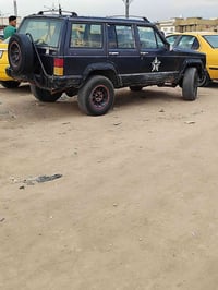 من رخصت ادمن جيب شاروكي موديل 1991 رقم بغداد الإنكليزي بسمي 35بيه مجال...