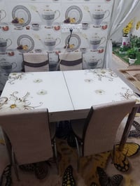 طبله • ٤ كراسي • مخدوشة
