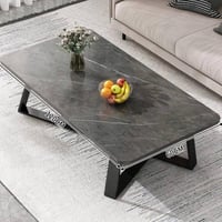 طاولة أنيقة بسطح رخامي باللون الرمادي الغامق. الأبعاد هي 120 سم طولًا ...