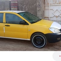 لانسر بغداد 10 بسمي السعر 70  سيارة بدون اي ضربة بس صبغ  الجمالية فقط ...