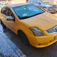 نيسان سنترا 2012 رقم بغداد دولي بسمي مكينه بيها خيط بخار باقي كله جديد...