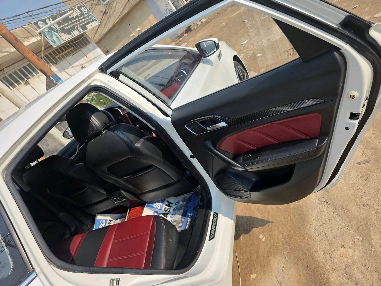 للبيع او للمراوس
السعر 112 مجال قليل جدا
مكان السيارة النجف 
موديل 2022 عداد 40 الف كيلو
اMG6 الفول مواصفات
رقم بغداد الجديد
محرك 1.5 تيربو
ناقل سرعة دبل كلتش7 سرعات
قوة المحرك 169 حصان
عزم الدوران 250 نيوتن / متر
مصابيح نهارية LED
مصابيح خلفية LED
مرايا كهربائية
اشارات في المرايا الكهربائية
مرايا قابلة للطي بشكل الكتروني
مقود جلد
مكابح توقف الكترونية EPB
مكابح انتظار الكترونية Auto Hold
نظام الثبات الالكتروني ESP
نظام توزيع قوة الكبح EPD
نظام مكابح المنعطفات CBC
نظام مراقبة ضغط الهواء في الاطارات
تكييف الكتروني ثنائي المنطقة
نوفذ كهربائية مع فتخ واغلاق اوتوماتيكي
مثبت سرعة 
ناقل سرعة في المقود ( بادل شيفتر )
بصمة
مسند يد خلفي مع حامل اكواب
مقود قابل للتعديل
شاشة 8 انش مع كاميرا
بلوتوث
مداخل USP مع شاحن
مداخل كهرباء 12 فولت
                                                           Android Auto                                                    
                                                        Apple Car Play                                                 
تحكم بالمقود
حساس خلفي
شاشة عدادات 3.5 انش
عادم مزدوج ( دبل اكزوزت )فتحة سقف
دوسات بنزين وبريك معدنية رياضية
ارضيات MG
ويل كب 18 المنيوم
اطارات بروجستون
مقاعد جلد
مقعد سائق كهربائي ب6 حركات
6 وسائد هوائية
نوفذ كهربائية مع فتح واغلاق اوتوماتيكي لجميع النوافذ نظام الاضاءة التلقائية
اغلاق النوافذ تلقائيا عن قفل السيارة
ضمان 6 سنوات او 200,000km ايهما اقرب
للاستفسار
***********
***********