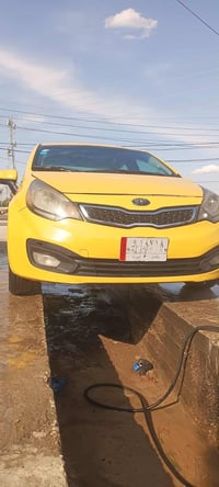 كيا ريو رقم بغداد دولي وارد امريكي محرك 1600  سعر ٨٠