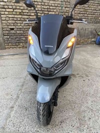 دراجه pcx جيل رابع لون سمنتي كلشي شغال  بيها حساس ادزحام ✅دبل أشاره✅ما...