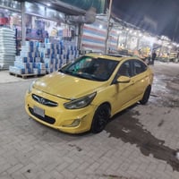 اكسنت 2014 وارد خليجي بيهه ضربه باب وجاملغ خلفي بدون دواخل كير مكينه ت...