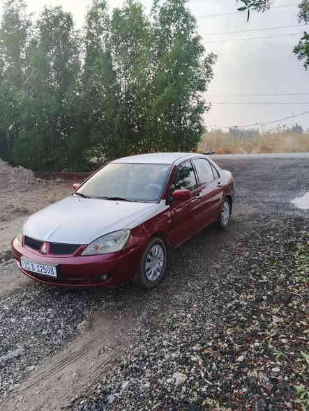 سلام عليكم لانسر للبيع موديل 2011 سنويه بسمي رقم بغداد مكينه وكير كفاله حداديه كفاله تخم تاير بيهه ضربه موضحه بلصوره   هلالات معمره + جاملغات مصبوغة صفحتين خلفية  /السعر 80 وبيه مجال / الرقم *********** / مكاني بغداد قرب جسر الفرنسي
