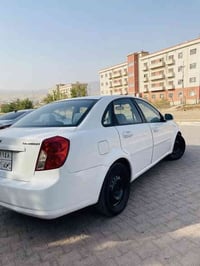 شوفرلێت اوپترا مودێل ٢٠١٠ بێ دەعم و بێ سبغ  گێر مەکینە و تبرید ب شەرت ...