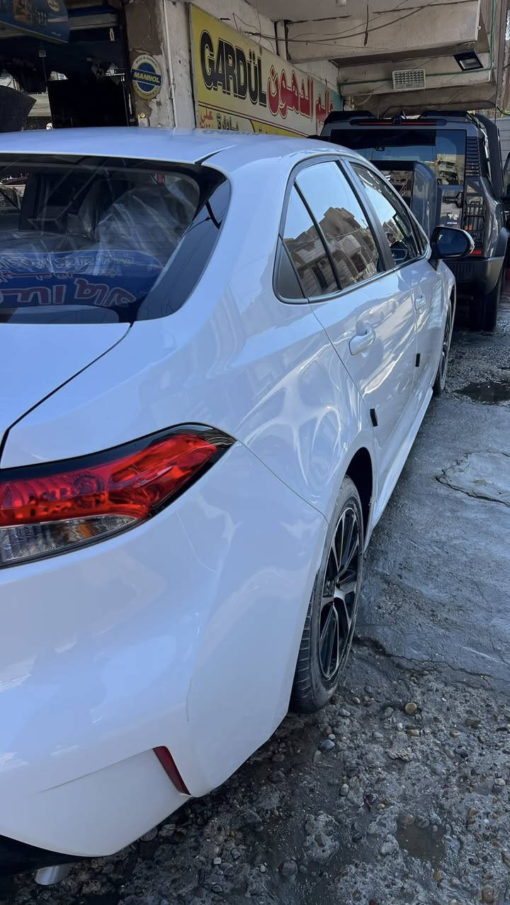 كورلا 2023  شكل الامريكي محرك 1800 هايبرد  رقم بغداد
(داخل اسود)
ماشية 19800 فقط
❇️محرك 1800 هايبرد شحن ذاتي
❇️بصمه + دخول ذكي
❇️هاندر بريك بصمه + اوتو هولد
❇️سلايت
❇️رادار امامي
❇️سياقه اليه
❇️تبريد قطعتين
❇️شاشه ابل كار بلي + كامره خلفيه
❇️مانع نزلاق + مود درايف +  ايفو مود
❇️حساس لايت كامل اوتو عالي ناصي اوتو + حساس ظغط اطار
❇️تحكم سترين كامل فول
❇️لايت زينون + لد صباحي + اشاره لد
سنوية جديدة بأسمي وهزة جديدة
سبير منازل
سيارة كفاله عامه عدا تكحيل جدا بسيط وموضح سونار جديد
عنواني بغداد
سعر  148$ وبيها مجال بسيط
رقم تواصل ***********
