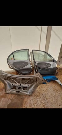 بيبان 2  وجامع  جهت السايق +  قبغ جنطه.   كيا ريو الشكل القديم    قيم ...