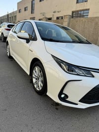 كورلا هايبرد موديل 2023ماشيه23.800 مواصفات سقف فتحه سلايد اوتوهولد اشا...