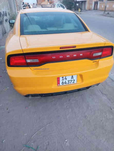 جارجر2012تكسي بسمي رقم دولي كيرمكينه جديدقبل سبوع صبغه جديدة تخم تاير حداديه ***********مكان سيارة لعمارة سعر155وبيهه مجال
